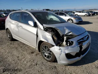 2013 Hyundai Accent GL with VIN KMHCT5AE0DU096122, listed as a Copart auction lot 41841885 with 124,371 mi miles and Salvage Title. Bid and sale history available at carsss.com. Image 4.