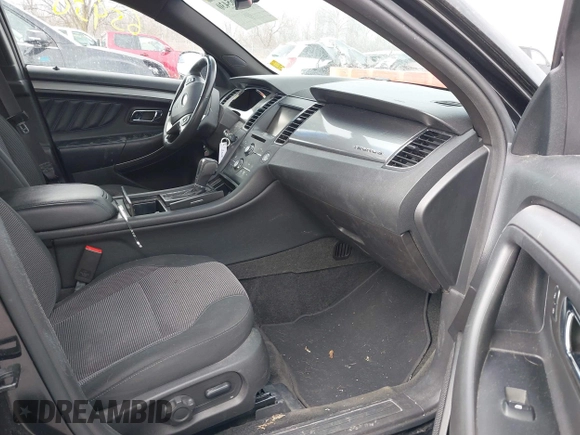 2013 Ford Taurus SEL with VIN 1FAHP2E86DG135835, listed as a IAAI auction lot 41665430 with 130,816 mi miles. Bid and sale history available at carsss.com. Image 5.