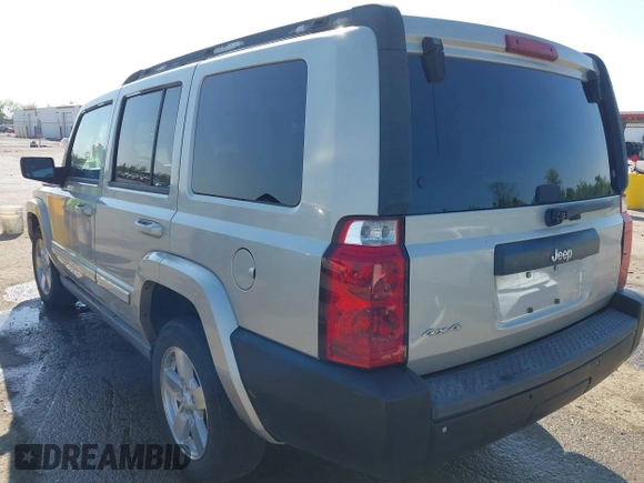 2007 Jeep Commander Sport z VIN 1J8HG48K07C559271, wystawiony jako IAAI lot #42032853 z przebiegiem 236 443 mil mil oraz . Historia ofert i sprzedaży dostępna na DreamBid. Obrazek 3.