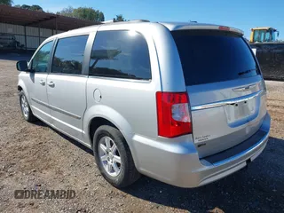 2012 Chrysler Town & Country Touring with VIN 2C4RC1BGXCR338160, listed as a IAAI auction lot 41042918 with 214,961 mi miles and . Bid and sale history available at DreamBid. Image 3.