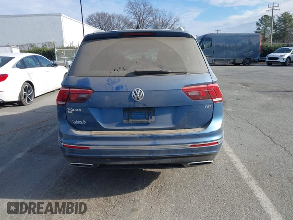 2018 Volkswagen Tiguan SEL Premium with VIN 3VV5B7AX0JM218427, listed as a IAAI auction lot 41188087 with 46,877 mi miles and . Bid and sale history available at DreamBid. Image 17.