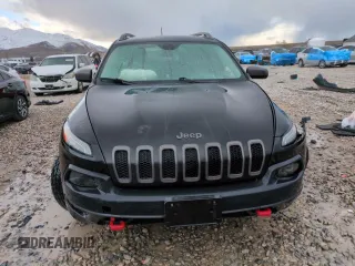 2014 Jeep Cherokee Trailhawk with VIN 1C4PJMBS1EW211570, listed as a Copart auction lot 51465845 with 156,320 mi miles and Salvage Title. Bid and sale history available at carsss.com. Image 5.