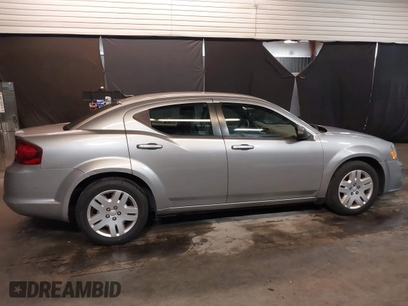 2014 Dodge Avenger SE with VIN 1C3CDZAB5EN228953, listed as a IAAI auction lot 41898027 with 33,731 mi miles. Bid and sale history available at carsss.com. Image 14.