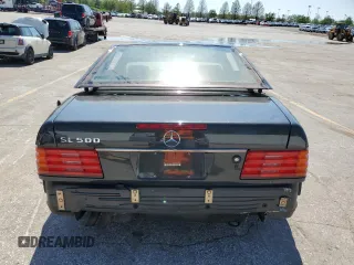 1992 Mercedes-Benz 500 с VIN WDBFA66E1NF048915, выставлен на аукционе Copart как лот 54102485 с пробегом Не указан миль и Чистый • Clean title. История ставок и продаж доступна на DreamBid. Изображение 6.
