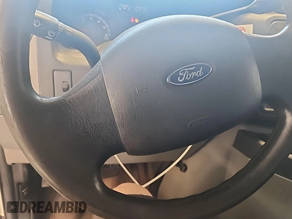 2010 Ford Econoline Cargo Commercial with VIN 1FTNE2EW4ADA72071, listed as a IAAI auction lot 42598880 with 186,263 mi miles and . Bid and sale history available at DreamBid. Image 3.