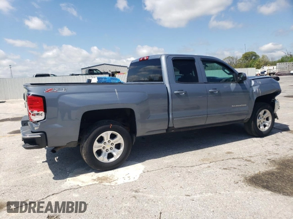 2015 Chevrolet Silverado 1500 LT with VIN 1GCVKREC7FZ435447, listed as a Copart auction lot 54519515 with 124,881 mi miles and Salvage Title. Bid and sale history available at DreamBid. Image 3.