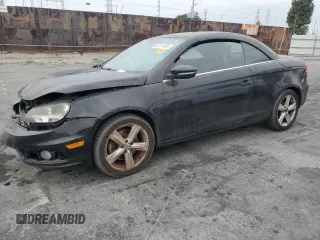 2012 Volkswagen Eos Lux with VIN WVWFW7AH6CV005880, listed as a Copart auction lot 82214934 with 149,477 mi miles and Salvage Title. Bid and sale history available at DreamBid. Image 1.