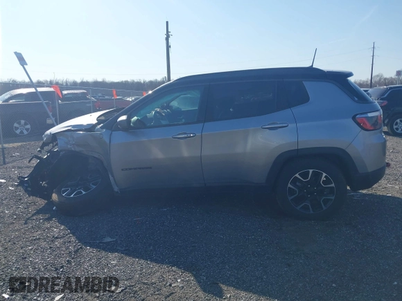 2020 Jeep Compass Trailhawk with VIN 3C4NJDDBXLT106663, listed as a IAAI auction lot 41791300 with 74,162 mi miles and . Bid and sale history available at carsss.com. Image 14.