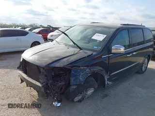 2013 Chrysler Town & Country Touring L with VIN 2C4RC1CG9DR778449, listed as a IAAI auction lot 42045779 with 217,776 mi miles and . Bid and sale history available at DreamBid. Image 2.