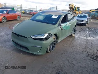 2022 Tesla Model X Plaid z VIN 7SAXCBE6XNF358023, wystawiony jako IAAI lot #41683857 z przebiegiem 42 821 mil mil oraz . Historia ofert i sprzedaży dostępna na DreamBid. Obrazek 23.