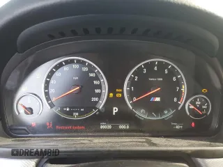 2014 BMW M5 z VIN WBSFV9C53ED594132, wystawiony jako Copart lot #56479355 z przebiegiem 89 020 mil mil oraz Szkody całkowita. Historia ofert i sprzedaży dostępna na DreamBid. Obrazek 9.
