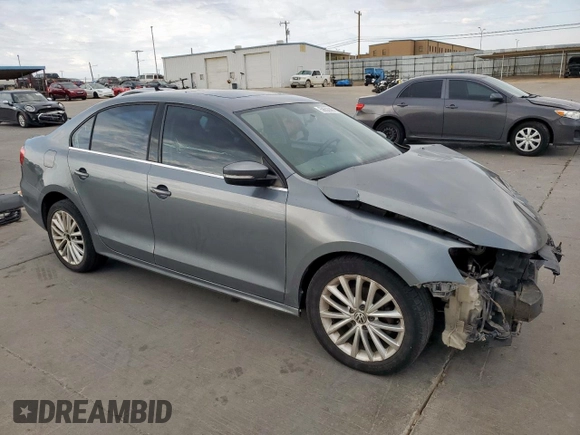 2011 Volkswagen Jetta SEL z VIN 3VWLX7AJXBM362116, wystawiony jako Copart lot #50632945 z przebiegiem 205 371 mil mil oraz Szkoda całkowita • Salvage title. Historia ofert i sprzedaży dostępna na DreamBid. Obrazek 4.