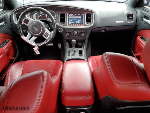 2012 Dodge Charger SRT8 with VIN 2C3CDXEJ8CH217246, listed as a Copart auction lot 71079334 with 105,528 mi miles and Salvage Title. Bid and sale history available at carsss.com. Image 8.