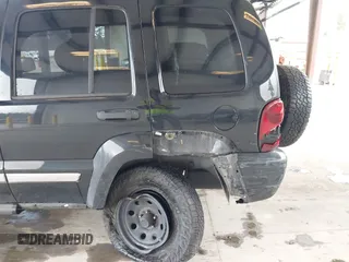2007 Jeep Liberty Limited with VIN 1J8GL58K07W658037, listed as a IAAI auction lot 41993738 with 203,771 mi miles. Bid and sale history available at carsss.com. Image 6.