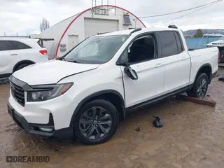 2021 Honda Ridgeline Sport with VIN 5FPYK3F16MB009377, listed as a IAAI auction lot 41130817 with 73,838 mi miles. Bid and sale history available at carsss.com. Image 2.