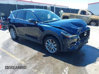 2021 Mazda CX-5 Grand Touring with VIN JM3KFBDM8M1426932, listed as a IAAI auction lot 41847448 with 17,933 mi miles. Bid and sale history available at carsss.com. Image 1.