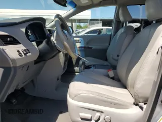 2014 Toyota Sienna XLE with VIN 5TDYK3DCXES496657, listed as a Copart auction lot 60498015 with 178,486 mi miles and Salvage title. Bid and sale history available at DreamBid. Image 7.
