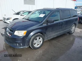 2013 Dodge Grand Caravan Crew with VIN 2C4RDGDG9DR740086, listed as a IAAI auction lot 41362852 with 145,881 mi miles and . Bid and sale history available at DreamBid. Image 16.