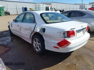 2002 Mazda Millenia S with VIN JM1TA222821725749, listed as a IAAI auction lot 41662948 with 165,088 mi miles and . Bid and sale history available at DreamBid. Image 3.
