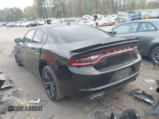 2018 Dodge Charger SXT Plus with VIN 2C3CDXHG3JH323343, listed as a IAAI auction lot 41948905 with 158,543 mi miles and . Bid and sale history available at carsss.com. Image 3.