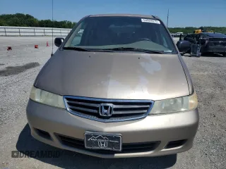 2004 Honda Odyssey LX with VIN 5FNRL18574B102634, listed as a Copart auction lot 54669075 with 141,057 mi miles and Salvage title. Bid and sale history available at DreamBid. Image 5.