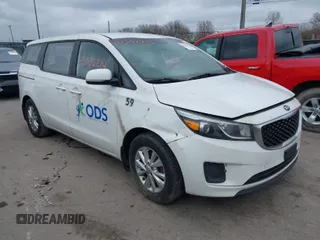 2015 Kia Sedona L with VIN KNDMA5C12F6031286, listed as a IAAI auction lot 42002214 with 185,814 mi miles. Bid and sale history available at carsss.com. Image 1.