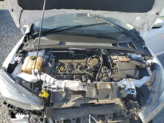 2015 Ford Focus Titanium z VIN 1FADP3N24FL262321, wystawiony jako Copart lot #59635525 z przebiegiem Nie podano mil oraz Szkoda całkowita • Salvage title. Historia ofert i sprzedaży dostępna na DreamBid. Obrazek 12.