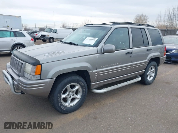 1998 Jeep Grand Cherokee Limited with VIN 1J4GZ88Z6WC307986, listed as a IAAI auction lot 41539972 with 150,652 mi miles. Bid and sale history available at carsss.com. Image 2.