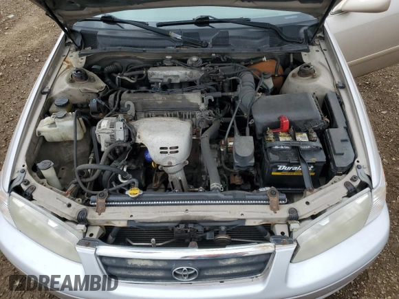 2000 Toyota Camry CE z VIN 4T1BG22K6YU991932, wystawiony jako Copart lot #55588155 z przebiegiem 188 363 mil mil oraz Szkoda całkowita • Salvage title. Historia ofert i sprzedaży dostępna na DreamBid. Obrazek 11.