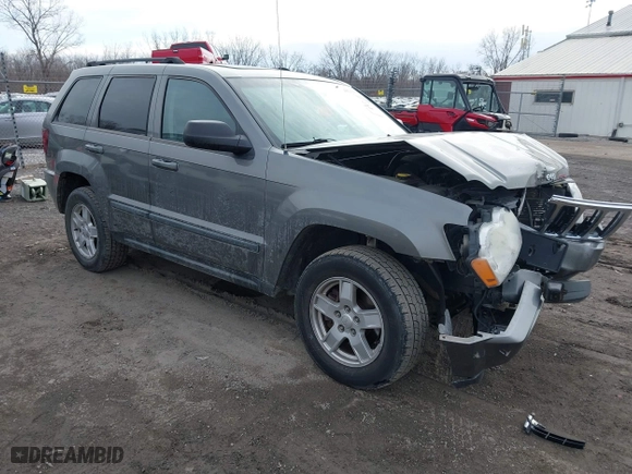 2007 Jeep Grand Cherokee Laredo with VIN 1J8GR48K57C556517, listed as a IAAI auction lot 41534166 with 158,914 mi miles. Bid and sale history available at carsss.com. Image 1.