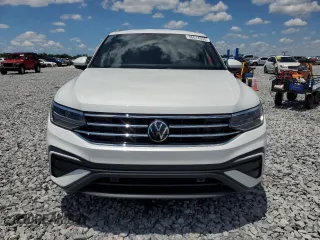 2023 Volkswagen Tiguan SE with VIN 3VV3B7AX6PM130952, listed as a Copart auction lot 56614335 with 24,996 mi miles and Salvage title. Bid and sale history available at DreamBid. Image 5.