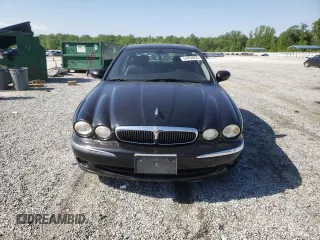2002 Jaguar X-Type z VIN SAJEA51C92WC28396, wystawiony jako Copart lot #54454905 z przebiegiem 145 694 mil mil oraz Szkody całkowita. Historia ofert i sprzedaży dostępna na DreamBid. Obrazek 5.