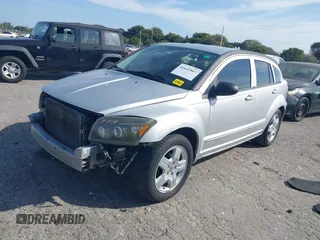 2009 Dodge Caliber SXT with VIN 1B3HB48A39D142674, listed as a IAAI auction lot 41642867 with 156,504 mi miles and . Bid and sale history available at carsss.com. Image 18.