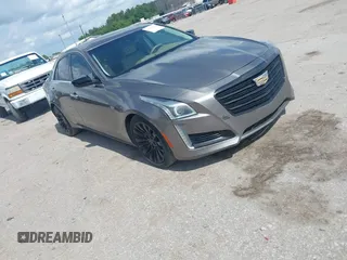 2014 Cadillac CTS Luxury RWD z VIN 1G6AR5S33E0172693, wystawiony jako IAAI lot #42464269 z przebiegiem 88 072 mil mil oraz . Historia ofert i sprzedaży dostępna na DreamBid. Obrazek 1.