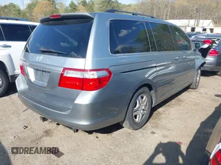 2007 Honda Odyssey EX-L with VIN 5FNRL38677B054173, listed as a IAAI auction lot 41888792 with 142,438 mi miles and . Bid and sale history available at DreamBid. Image 4.