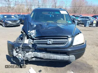 2005 Honda Pilot EX-L with VIN 5FNYF18555B043104, listed as a IAAI auction lot 41888235 with 127,781 mi miles. Bid and sale history available at carsss.com. Image 12.