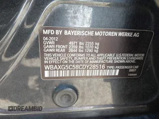 2012 BMW 5 Series 528i with VIN WBAXG5C58CDY28516, listed as a IAAI auction lot 41907803 with 116,499 mi miles. Bid and sale history available at carsss.com. Image 9.