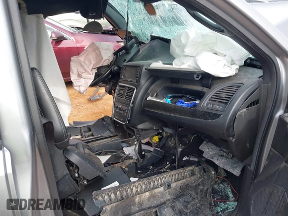 2019 Dodge Grand Caravan SE with VIN 2C4RDGBG3KR639447, listed as a IAAI auction lot 40960702 with Not Provided miles and . Bid and sale history available at DreamBid. Image 5.