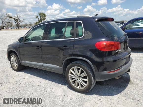 2014 Volkswagen Tiguan SE z VIN WVGAV3AX8EW613762, wystawiony jako Copart lot #61385765 z przebiegiem 167 278 mil mil oraz Czysty tytuł • Clean title. Historia ofert i sprzedaży dostępna na DreamBid. Obrazek 2.