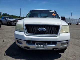 2004 Ford F-150 XLT with VIN 1FTRW14W44KB80961, listed as a Copart auction lot 58546585 with 843,055 mi miles and Salvage title. Bid and sale history available at DreamBid. Image 5.