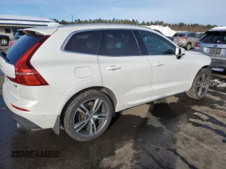 2018 Volvo XC60 Momentum z VIN LYVA22RK4JB113565, wystawiony jako Copart lot #45884295 z przebiegiem 69 389 mil mil oraz Szkoda całkowita • Salvage title. Historia ofert i sprzedaży dostępna na DreamBid. Obrazek 3.