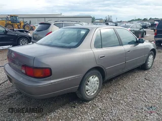 1996 Toyota Camry DX with VIN JT2BG12K1T0356821, listed as a IAAI auction lot 41860018 with 278,326 mi miles. Bid and sale history available at carsss.com. Image 4.