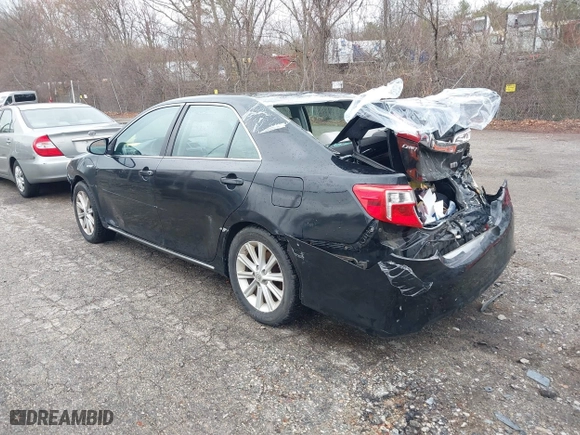 2013 Toyota Camry Hybrid LE with VIN 4T1BD1FK5DU089991, listed as a IAAI auction lot 41953719 with 222,713 mi miles. Bid and sale history available at carsss.com. Image 3.
