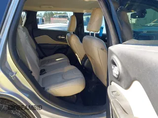 2016 Jeep Cherokee Limited with VIN 1C4PJLDB8GW239294, listed as a IAAI auction lot 41675712 with 140,491 mi miles. Bid and sale history available at carsss.com. Image 8.