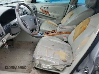 2002 Infiniti I35 Luxury z VIN JNKDA31A32T015213, wystawiony jako Copart lot #78977614 z przebiegiem 208 434 mil mil oraz Szkoda całkowita • Salvage title. Historia ofert i sprzedaży dostępna na DreamBid. Obrazek 7.