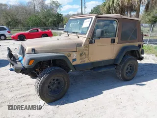 2000 Jeep Wrangler Sahara with VIN 1J4FA59S8YP763468, listed as a IAAI auction lot 41554183 with 182,922 mi miles. Bid and sale history available at carsss.com. Image 2.