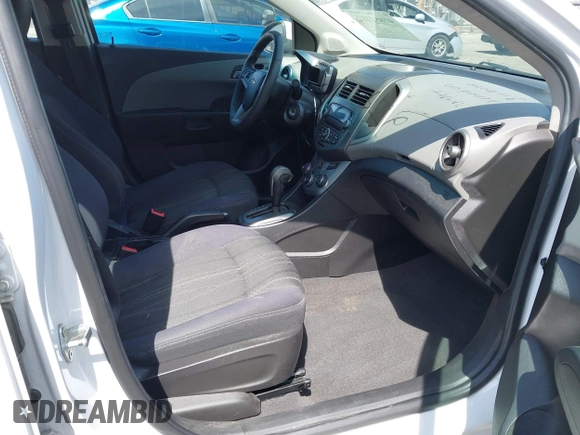 2014 Chevrolet Sonic LT with VIN 1G1JC5SH9E4212898, listed as a IAAI auction lot 41852112 with 121,382 mi miles and . Bid and sale history available at DreamBid. Image 5.
