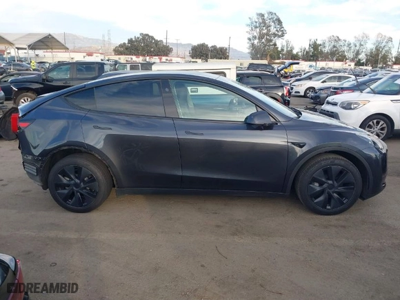 2024 Tesla Model Y with VIN 7SAYGDED7RF153140, listed as a IAAI auction lot 41476728 with NaN miles. Bid and sale history available at carsss.com. Image 14.