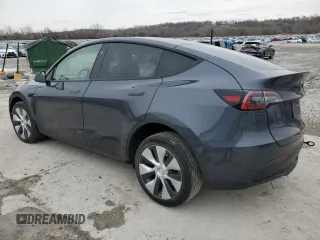 2023 Tesla Model Y Long Range z VIN 7SAYGDEE8PF884567, wystawiony jako Copart lot #45181465 z przebiegiem 16 653 mil mil oraz Szkoda całkowita • Salvage title. Historia ofert i sprzedaży dostępna na DreamBid. Obrazek 2.
