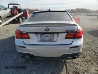 2013 BMW 7 Series 750i xDrive z VIN WBAYB6C53DD223796, wystawiony jako Copart lot #79402144 z przebiegiem 144 125 mil mil oraz Czysty tytuł • Clean title. Historia ofert i sprzedaży dostępna na DreamBid. Obrazek 6.